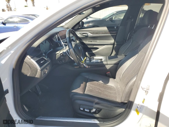 2019 BMW 7 Series 750i with VIN WBA7F0C5XKGM25771, listed as a Copart auction lot 47239195 with 73,691 mi miles and Salvage Title. Bid and sale history available at carsss.com. Image 7.