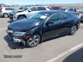 2020 Honda Civic LX с VIN 19XFC2F63LE210936, выставлен на аукционе IAAI как лот 42163809 с пробегом 89 955 миль миль и . История ставок и продаж доступна на DreamBid. Изображение 17.