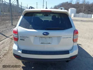 2015 Subaru Forester 2.5i Touring with VIN JF2SJAWC5FH546754, listed as a IAAI auction lot 41665828 with 97,231 mi miles. Bid and sale history available at carsss.com. Image 16.