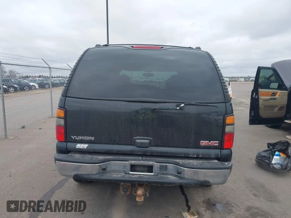2004 GMC Yukon SLT with VIN 1GKEK13Z24J113954, listed as a IAAI auction lot 41950157 with 174,021 mi miles. Bid and sale history available at carsss.com. Image 17.