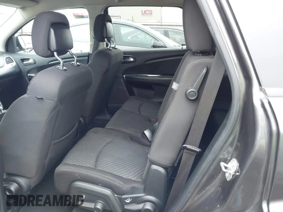 2017 Dodge Journey SE with VIN 3C4PDCAB9HT603595, listed as a IAAI auction lot 41914690 with 104,960 mi miles and . Bid and sale history available at DreamBid. Image 8.