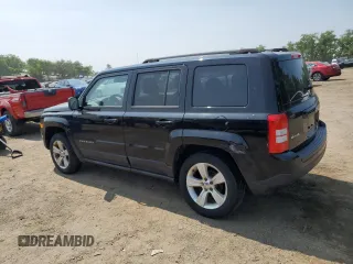 2014 Jeep Patriot Latitude with VIN 1C4NJRFB3ED761587, listed as a Copart auction lot 60554245 with 138,763 mi miles and Salvage title. Bid and sale history available at DreamBid. Image 2.