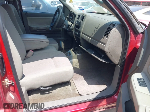 2006 Dodge Dakota SLT z VIN 1D7HE42N66S629432, wystawiony jako IAAI lot #42319636 z przebiegiem 187 086 mil mil oraz . Historia ofert i sprzedaży dostępna na DreamBid. Obrazek 5.