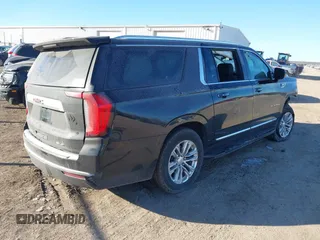 2023 GMC Yukon XL SLT z VIN 1GKS2GKT9PR208083, wystawiony jako IAAI lot #41285870 z przebiegiem 69 901 mil mil oraz . Historia ofert i sprzedaży dostępna na DreamBid. Obrazek 4.