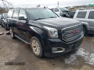 2017 GMC Yukon SLE with VIN 1GKS2AKC0HR136012, listed as a IAAI auction lot 41707322 with 81,821 mi miles. Bid and sale history available at carsss.com. Image 1.