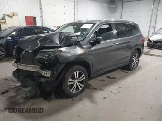 2017 Honda Pilot EX-L with VIN 5FNYF6H51HB080796, listed as a IAAI auction lot 40702843 with Not Provided miles and . Bid and sale history available at DreamBid. Image 17.