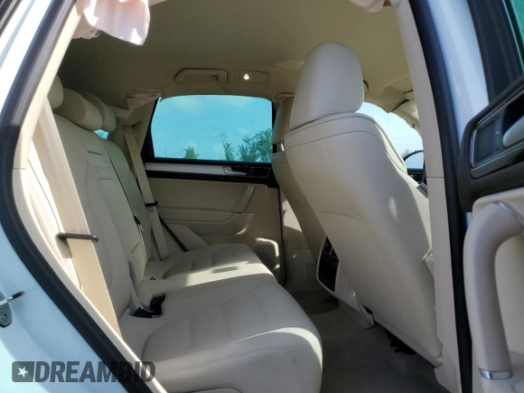 2017 Volkswagen Touareg Sport with VIN WVGEF7BP0HD006792, listed as a Copart auction lot 47895813 with 52,432 mi miles and . Bid and sale history available at DreamBid. Image 11.