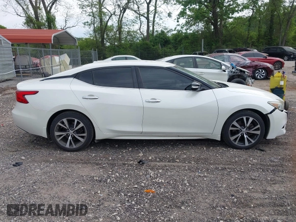 2016 Nissan Maxima SV z VIN 1N4AA6APXGC419665, wystawiony jako IAAI lot #42085939 z przebiegiem 158 000 mil mil oraz . Historia ofert i sprzedaży dostępna na DreamBid. Obrazek 14.