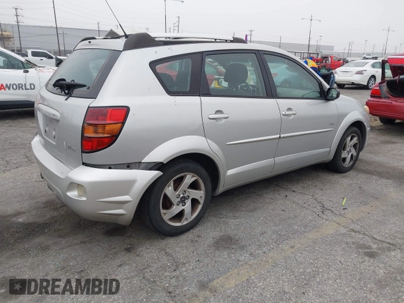 2003 Pontiac Vibe with VIN 5Y2SL62833Z438839, listed as a IAAI auction lot 41977690 with 234,670 mi miles. Bid and sale history available at carsss.com. Image 4.
