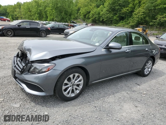 2018 Mercedes-Benz E 300 with VIN WDDZF4KBXJA337966, listed as a Copart auction lot 58718355 with 54,264 mi miles and Salvage title. Bid and sale history available at DreamBid. Image 1.