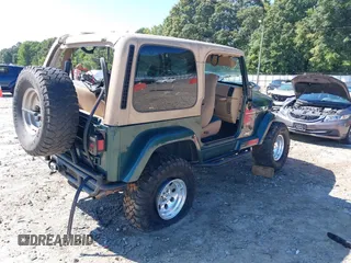 2001 Jeep Wrangler Sahara with VIN 1J4FA59S71P340368, listed as a IAAI auction lot 40148603 with 138,710 mi miles. Bid and sale history available at carsss.com. Image 4.