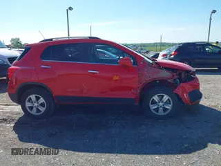 2018 Chevrolet Trax LT z VIN 3GNCJPSB0JL262159, wystawiony jako IAAI lot #42216660 z przebiegiem 27 369 mil mil oraz . Historia ofert i sprzedaży dostępna na DreamBid. Obrazek 13.