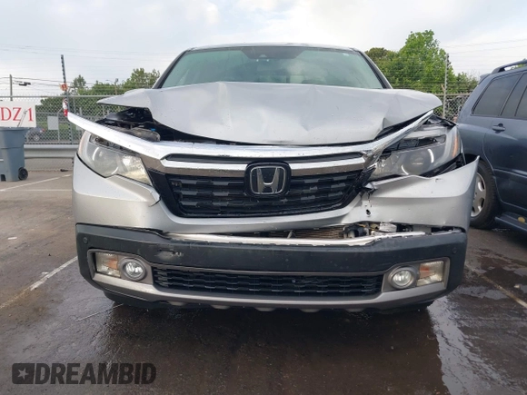 2019 Honda Ridgeline RTL-E with VIN 5FPYK3F72KB026100, listed as a IAAI auction lot 42205910 with 78,359 mi miles and . Bid and sale history available at DreamBid. Image 12.