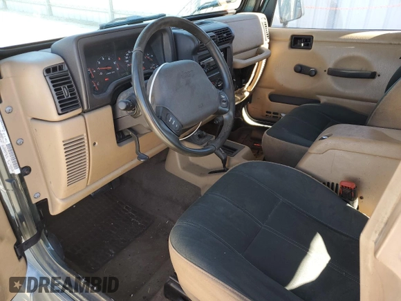 2002 Jeep Wrangler Sahara with VIN 1J4FA59S02P761365, listed as a Copart auction lot 81899144 with 208,429 mi miles and Salvage title. Bid and sale history available at DreamBid. Image 8.