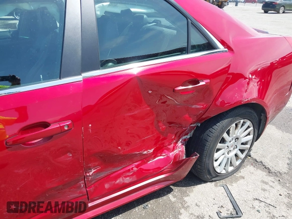 2013 Cadillac CTS Luxury with VIN 1G6DE5E55D0157455, listed as a IAAI auction lot 42469959 with 107,274 mi miles and . Bid and sale history available at DreamBid. Image 6.