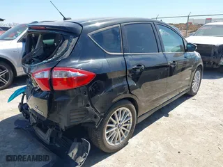 2013 Ford C-Max Hybrid SE with VIN 1FADP5AU3DL519923, listed as a IAAI auction lot 41865952 with 211,115 mi miles. Bid and sale history available at carsss.com. Image 4.