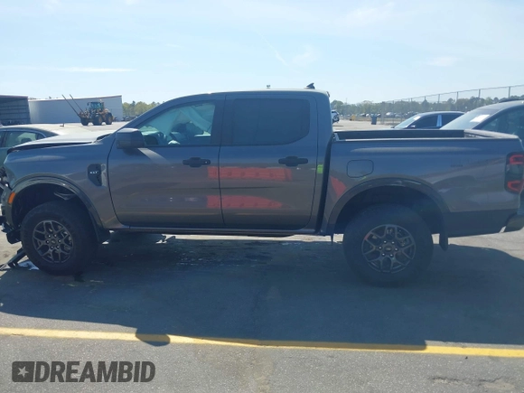 2024 Ford Ranger XLT with VIN 1FTER4GHXRLE46487, listed as a IAAI auction lot 41899384 with 5,570 mi miles. Bid and sale history available at carsss.com. Image 14.