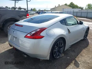 2018 Nissan 370Z Sport with VIN JN1AZ4EH7JM572602, listed as a IAAI auction lot 41902662 with 76,262 mi miles and . Bid and sale history available at DreamBid. Image 4.
