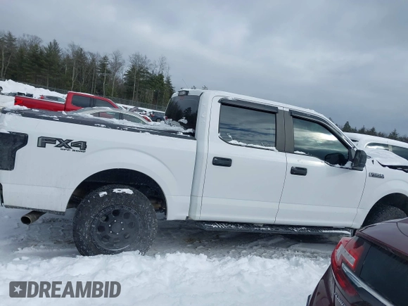 2018 Ford F-150 XL with VIN 1FTEW1E58JKD67099, listed as a IAAI auction lot 41526282 with 128,420 mi miles. Bid and sale history available at carsss.com. Image 13.