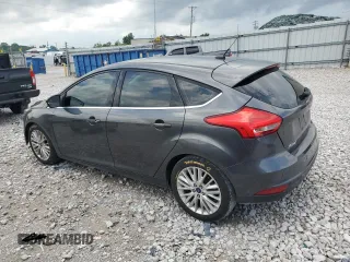 2017 Ford Focus Titanium z VIN 1FADP3N22HL307260, wystawiony jako Copart lot #61399785 z przebiegiem 103 293 mil mil oraz Szkoda całkowita • Salvage title. Historia ofert i sprzedaży dostępna na DreamBid. Obrazek 2.