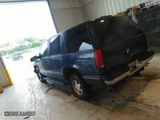 1999 Chevrolet Tahoe with VIN 1GNEC13R9XJ536325, listed as a IAAI auction lot 41475643 with 206,804 mi miles. Bid and sale history available at carsss.com. Image 3.