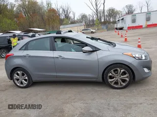 2014 Hyundai Elantra GT with VIN KMHD35LH6EU165019, listed as a IAAI auction lot 42016057 with 121,794 mi miles. Bid and sale history available at carsss.com. Image 13.