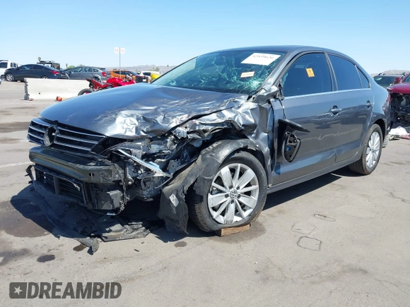 2015 Volkswagen Jetta SE with VIN 3VWD17AJ6FM406091, listed as a IAAI auction lot 42539626 with 82,005 mi miles and . Bid and sale history available at DreamBid. Image 2.