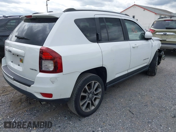 2014 Jeep Compass Limited with VIN 1C4NJDCB6ED684897, listed as a IAAI auction lot 41920568 with 175,196 mi miles. Bid and sale history available at carsss.com. Image 4.