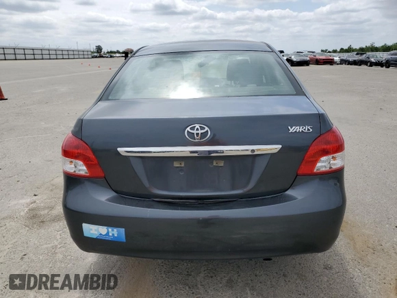 2012 Toyota Yaris with VIN JTDBT4K38CL036729, listed as a Copart auction lot 53514995 with 232,180 mi miles and Salvage Title. Bid and sale history available at DreamBid. Image 6.