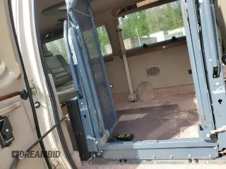 2013 Ford Econoline Cargo Commercial with VIN 1FTNE1EL3DDA02131, listed as a Copart auction lot 54057485 with 63,630 mi miles and Salvage title. Bid and sale history available at DreamBid. Image 11.