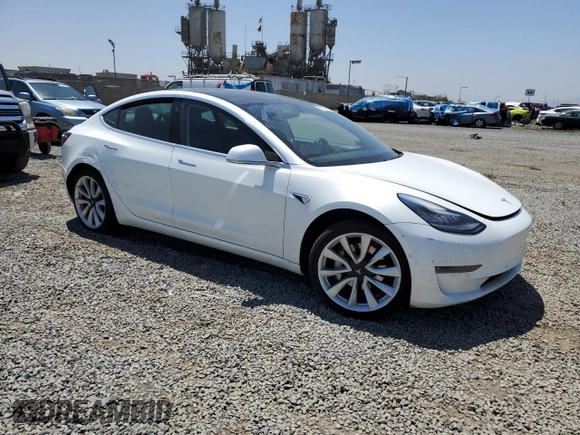 2019 Tesla Model 3 Mid Range z VIN 5YJ3E1EA3KF402556, wystawiony jako Copart lot #56212875 z przebiegiem 89 022 mil mil oraz Szkoda całkowita • Salvage title. Historia ofert i sprzedaży dostępna na DreamBid. Obrazek 4.