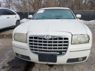 2006 Chrysler 300 Touring with VIN 2C3KA53G36H525834, listed as a IAAI auction lot 41274514 with 147,302 mi miles. Bid and sale history available at carsss.com. Image 6.