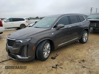 2020 Cadillac XT6 FWD Premium Luxury z VIN 1GYKPCRS5LZ225809, wystawiony jako Copart lot #50485045 z przebiegiem 19 821 mil mil oraz Szkody całkowita. Historia ofert i sprzedaży dostępna na DreamBid. Obrazek 1.