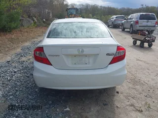 2012 Honda Civic EX with VIN 2HGFB2F81CH607670, listed as a IAAI auction lot 42128341 with 104,090 mi miles and . Bid and sale history available at DreamBid. Image 16.