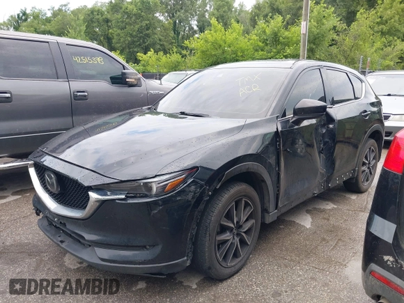 2018 Mazda CX-5 Grand Touring with VIN JM3KFBDM2J0400828, listed as a IAAI auction lot 42540846 with 254,672 mi miles and . Bid and sale history available at DreamBid. Image 18.