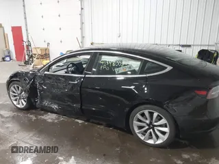 2018 Tesla Model 3 Long Range Battery with VIN 5YJ3E1EB7JF086778, listed as a IAAI auction lot 41348008 with 74,491 mi miles and . Bid and sale history available at DreamBid. Image 6.