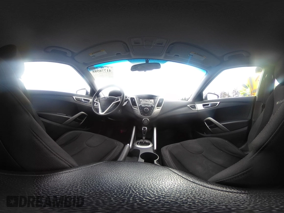 2012 Hyundai Veloster w/Gray Int z VIN KMHTC6AD7CU037130, wystawiony jako IAAI lot #41778588 z przebiegiem 125 549 mil mil oraz . Historia ofert i sprzedaży dostępna na DreamBid. Obrazek 18.