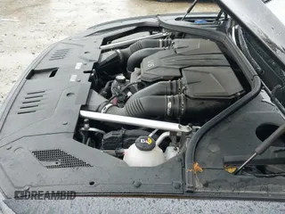 2022 Genesis GV70 Sport with VIN KMUMCDTC0NU018758, listed as a IAAI auction lot 41735229 with 42,717 mi miles and . Bid and sale history available at DreamBid. Image 20.