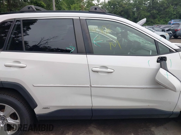 2019 Toyota RAV4 Hybrid LE with VIN JTMMWRFV9KD021285, listed as a IAAI auction lot 42757660 with 74,870 mi miles and . Bid and sale history available at DreamBid. Image 13.