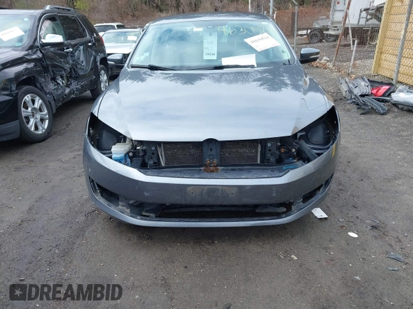 2015 Volkswagen Passat Wolfsburg Edition with VIN 1VWAT7A37FC026077, listed as a IAAI auction lot 41630524 with 136,966 mi miles and . Bid and sale history available at DreamBid. Image 6.