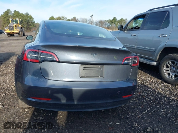 2023 Tesla Model 3 with VIN 5YJ3E1EAXPF666252, listed as a IAAI auction lot 42009929 with 27,328 mi miles and . Bid and sale history available at DreamBid. Image 17.