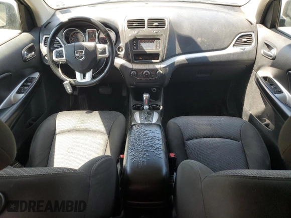2020 Dodge Journey SE Value with VIN 3C4PDCABXLT274558, listed as a Copart auction lot 50407555 with 106,404 mi miles and Salvage Title. Bid and sale history available at DreamBid. Image 8.