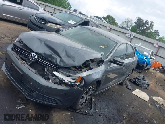2014 Volkswagen Jetta SE z VIN 3VWD17AJ9EM298175, wystawiony jako IAAI lot #42084756 z przebiegiem 93 039 mil mil oraz . Historia ofert i sprzedaży dostępna na DreamBid. Obrazek 16.