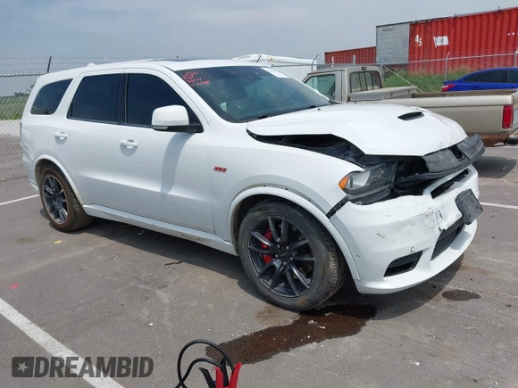 2018 Dodge Durango SRT with VIN 1C4SDJGJ2JC434843, listed as a IAAI auction lot 42434327 with 144,483 mi miles and . Bid and sale history available at DreamBid. Image 1.