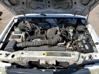 2004 Ford Ranger XL with VIN 1FTZR14U84PB06774, listed as a Copart auction lot 82596884 with 104,796 mi miles and Salvage Title. Bid and sale history available at DreamBid. Image 11.