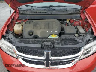 2014 Dodge Journey SXT z VIN 3C4PDDBG5ET290590, wystawiony jako Copart lot #57758595 z przebiegiem 87 443 mil mil oraz Szkoda całkowita • Salvage title. Historia ofert i sprzedaży dostępna na DreamBid. Obrazek 12.