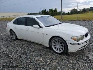 2004 BMW 7 Series 745Li with VIN WBAGN63494DS47871, listed as a Copart auction lot 60128164 with 0 mi miles and Salvage Title. Bid and sale history available at carsss.com. Image 4.