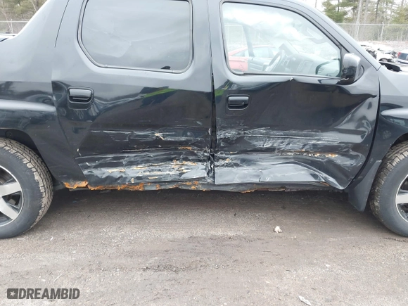 2014 Honda Ridgeline SE with VIN 5FPYK1F66EB005881, listed as a IAAI auction lot 41977349 with 184,567 mi miles. Bid and sale history available at carsss.com. Image 6.