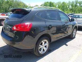 2009 Nissan Rogue SL with VIN JN8AS58T29W321840, listed as a IAAI auction lot 42157739 with 214,475 mi miles and . Bid and sale history available at DreamBid. Image 4.