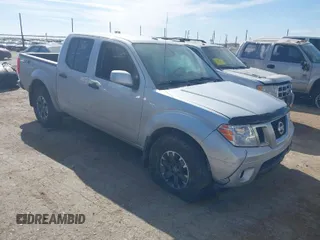 2018 Nissan Frontier SV with VIN 1N6AD0EV0JN761092, listed as a IAAI auction lot 41502701 with 103,900 mi miles and . Bid and sale history available at DreamBid. Image 1.